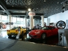 top-marques-monaco-2009-innotech-corvettes-red-c6-and-yellow-z06-on-innotech-e3-stand.jpg